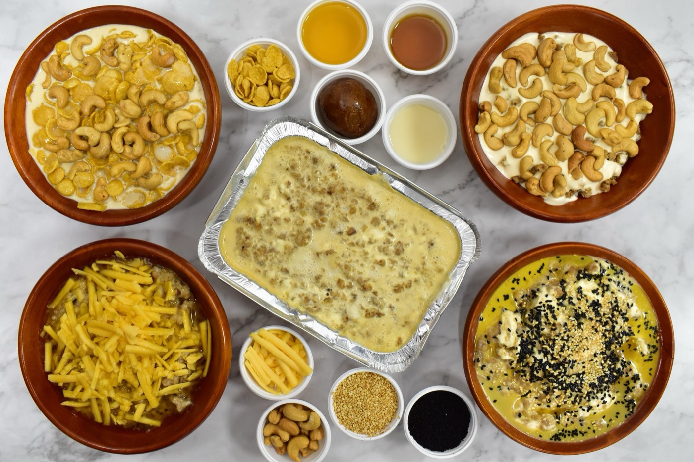 تشكيلة أطباق العريكة والمعصوب من مطعم العروسي